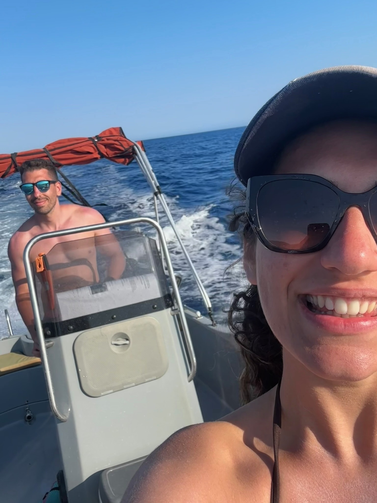Foivos and Alexandra together on a boat at sea
