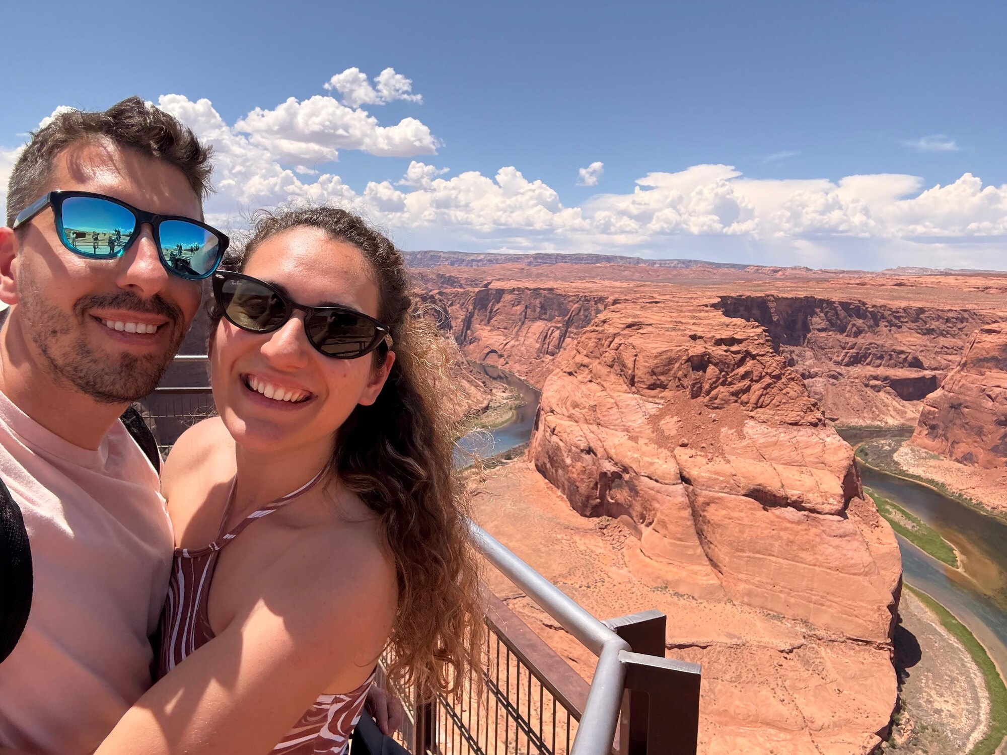 Foivos and Alexandra smiling at a canyon overlook