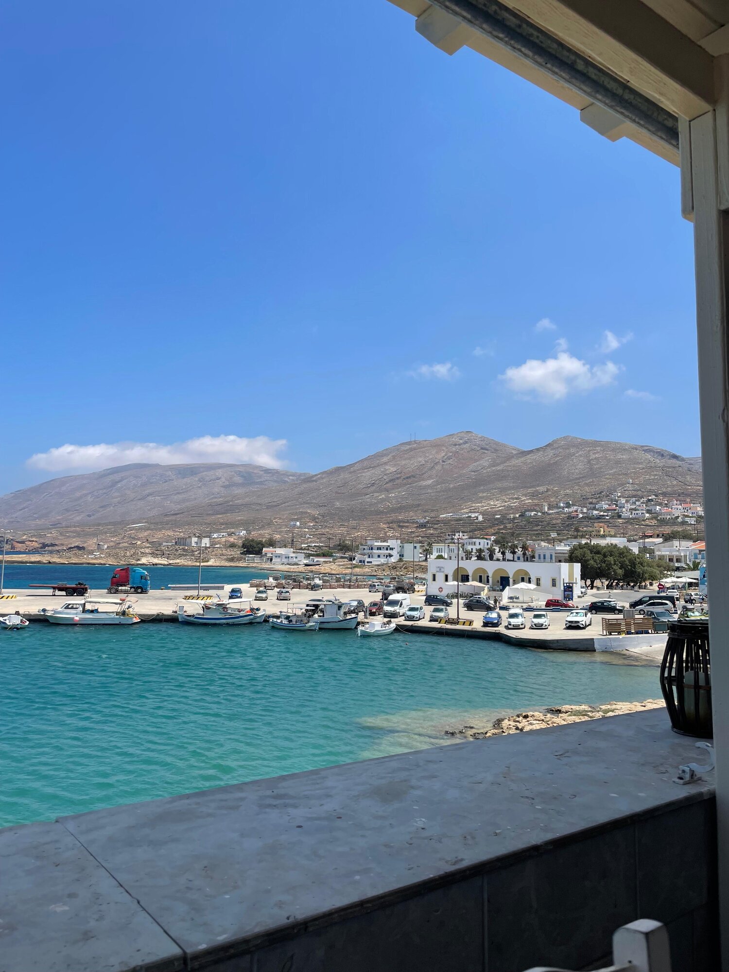 Fishing boats and turquoise water in Fry and Bouka harbour, Kasos
